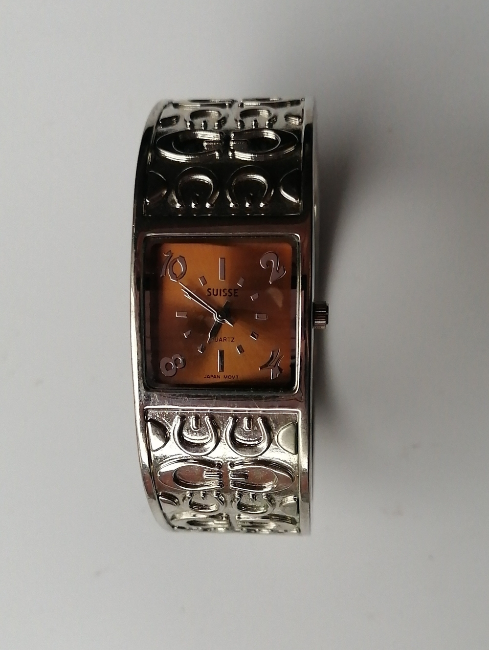 Suisse Unisex Wristwatch Quartz Hinged Cuff Silvertone Patterned Band Amber Dial